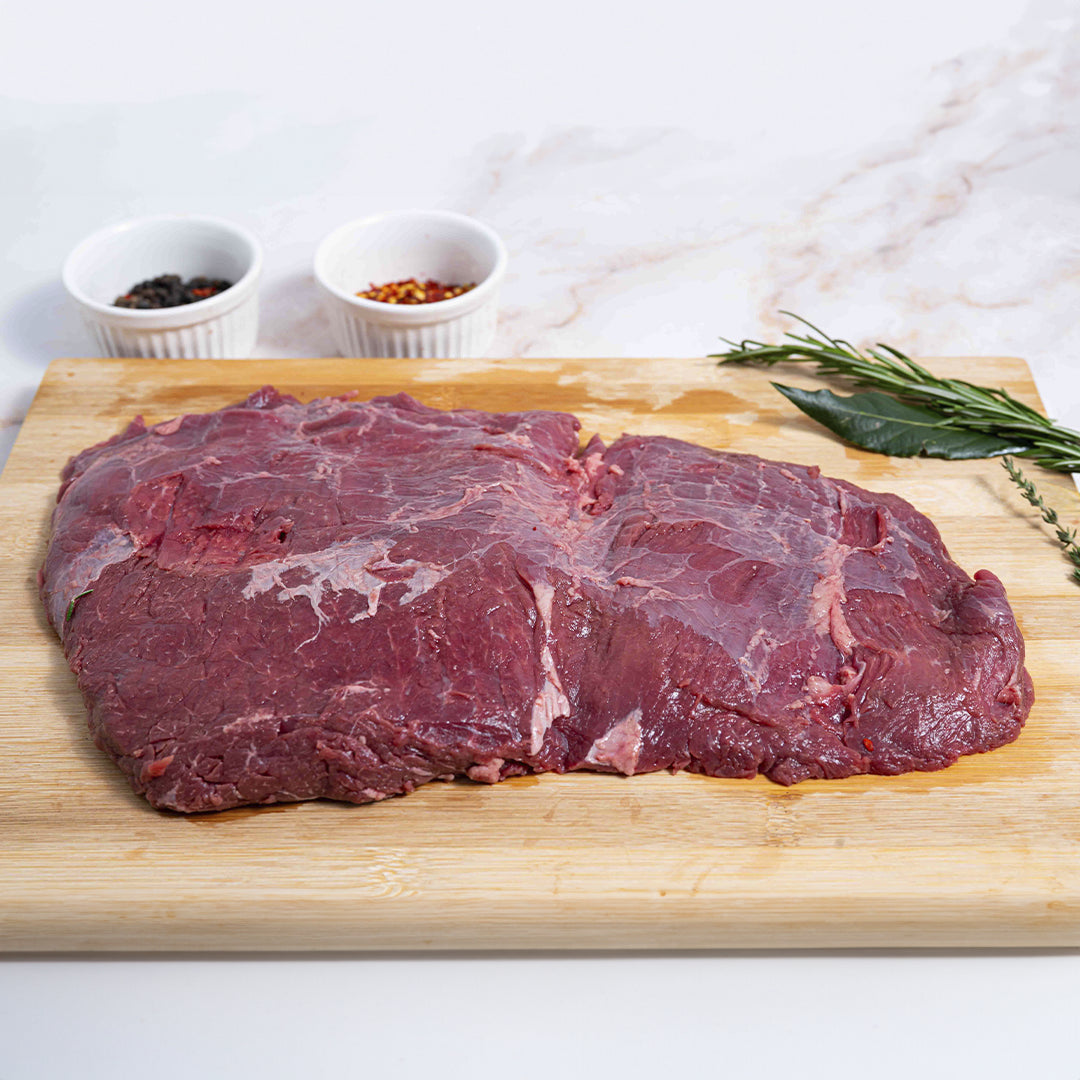 foto Vacio de Res sobre tabla de madera